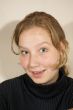 young woman looking surprised