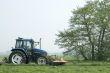 mowing grass