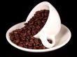 Cup Of Coffee Beans On Saucer