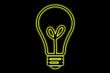 Yellow Glowing Light Bulb On A Black Background
