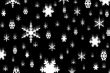 Falling Snowflakes On A Black Background