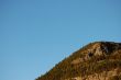 mountainside with blue sky