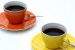 Two cups of coffee.