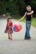 The brother and sister on walk in park