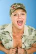 model in khaki poses in studio