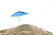One blue parasol on the beach