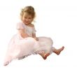 Small girl in pink gown on white background.