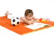 Kid is reading a book
