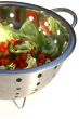 Salad in strainer.