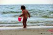 child playing on the beach