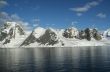 Reflections of glacial icefalls and mountains