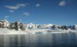 Reflections of glacial icefalls and mountains