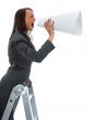 Business woman yells in megaphone