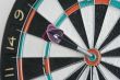 One dart in centre of the dartboard