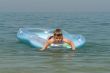 boy in an inflatable boat