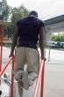 men lifting on bench