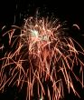 Night fireworks upon dark sky