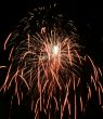 Night fireworks upon dark sky