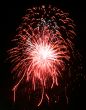 Night fireworks upon dark sky