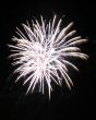 Night fireworks upon dark sky