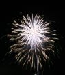 Night fireworks upon dark sky