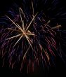 Night fireworks upon dark sky
