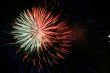 Night fireworks upon dark sky