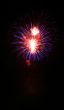 Night fireworks upon dark sky