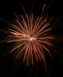 Night fireworks upon dark sky