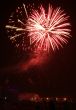Night celebration fireworks upon dark sky