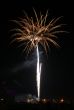 Night celebration fireworks upon dark sky