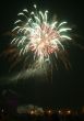 Night celebration fireworks upon dark sky