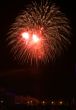 Night celebration fireworks upon dark sky