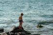 boy in sea waves