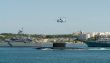 helicopter over a submarine