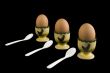 egg-cups with eggs to eat