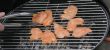 Chicken breasts on a grill