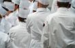 Group Of Chefs Standing In Uniform Whites