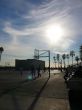 Beachside Basketball Game at Dusk