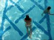 Aerial View of Swimmers in Summer Pool
