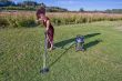 windy field woman cleaner