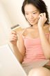Asian Woman With Credit Card