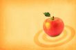 red apple on paper