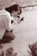 Girl with SLR photo camera