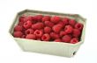 raspberries in cardboard box
