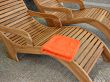 Sunbeds with one orange towel