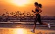 woman running on the beach
