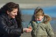 mother and cute boy on the beach