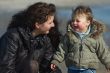 mother and cute boy on the beach