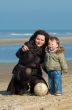 mother and cute boy on the beach